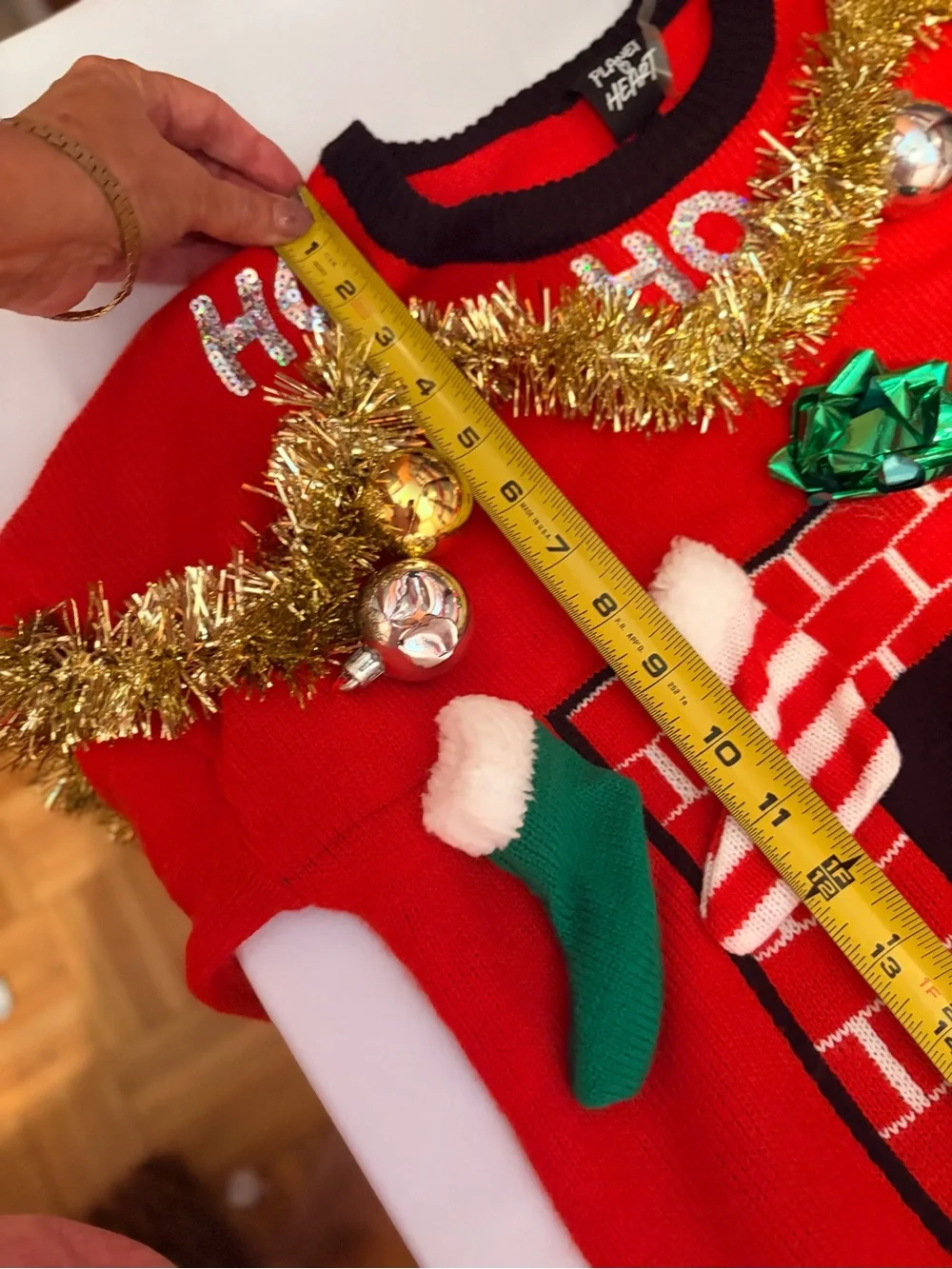 Red Holiday Fireplace Sweater with Tinsel and Stockings